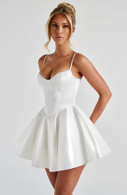 Poppy Mini Dress in Ivory showcasing a flattering fit with underwired cups and a voluminous skirt, perfect for any occasion.